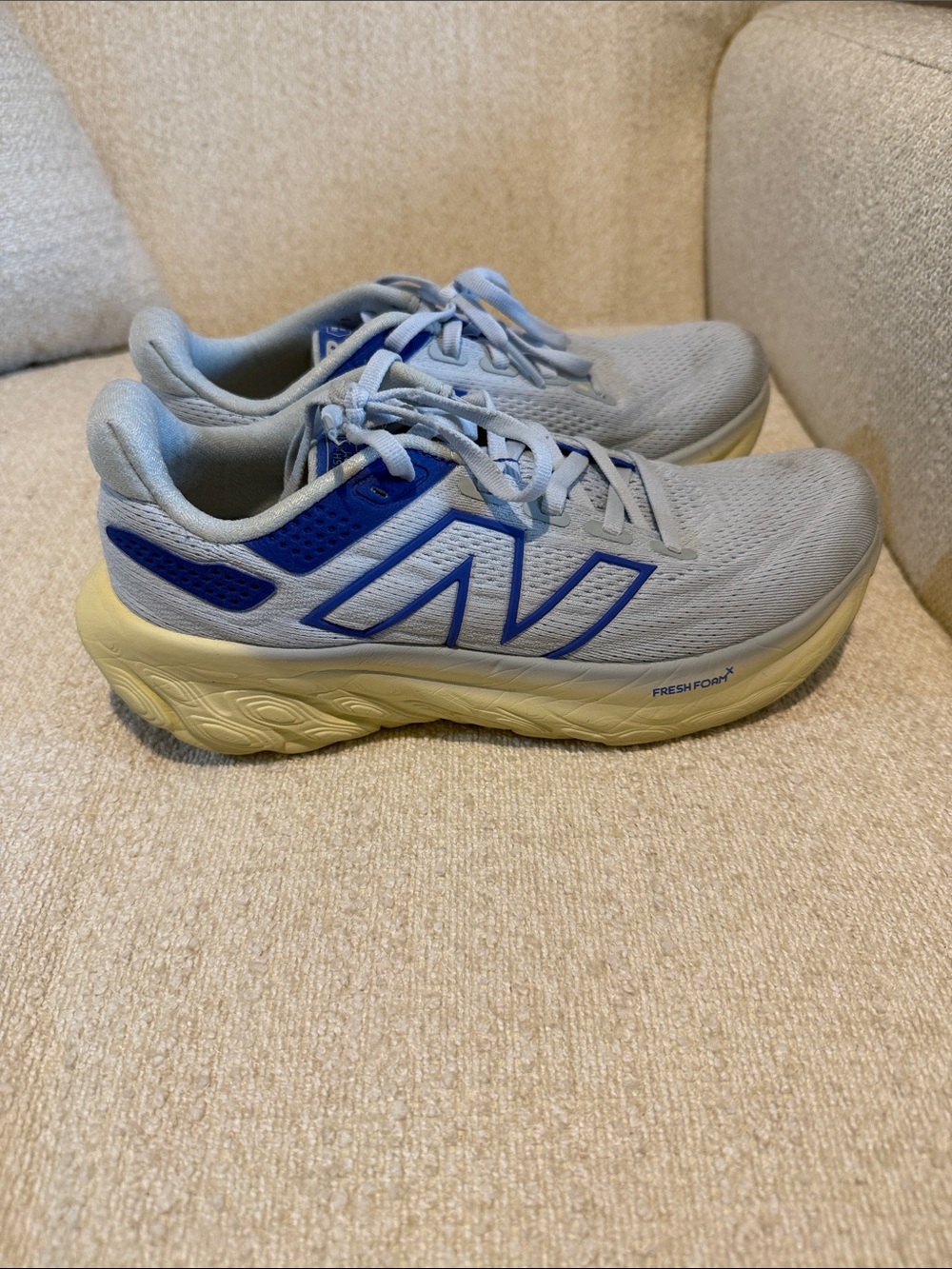 New Balance Pale Blue Running Sneakers with Royal Blue Details